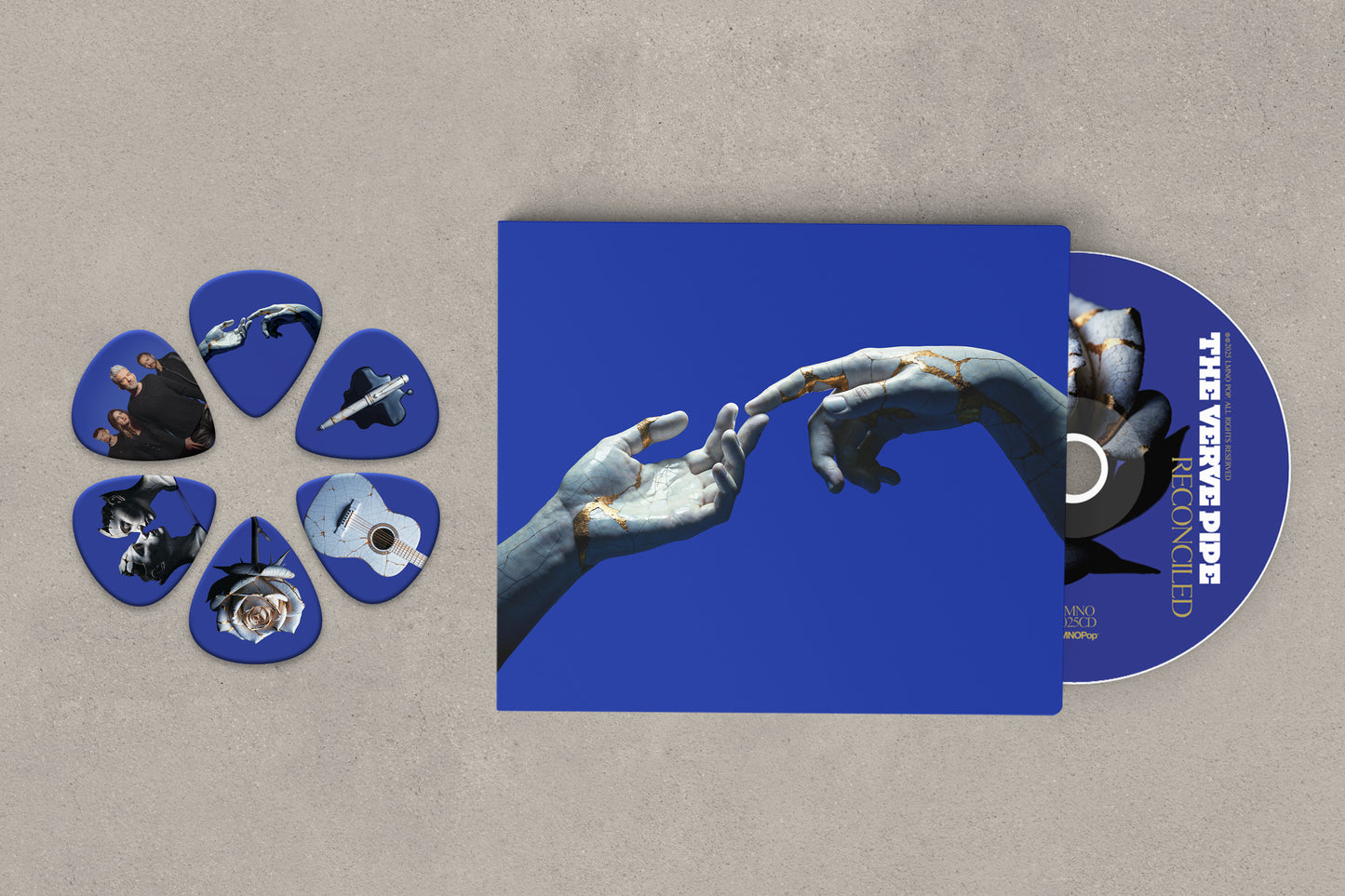 Reconciled CD + Guitar Picks Bundle